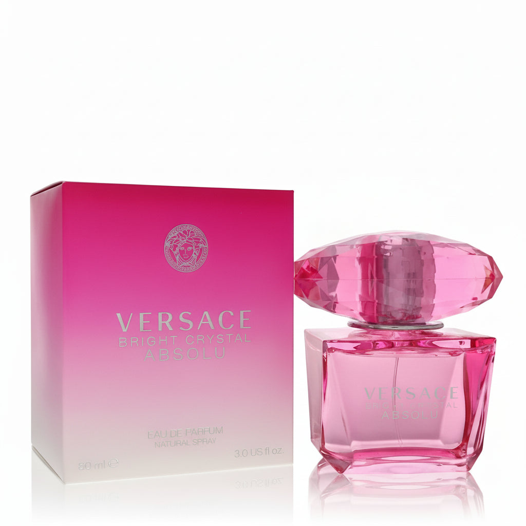 Pink Versace perfume bottle and packaging on a white background